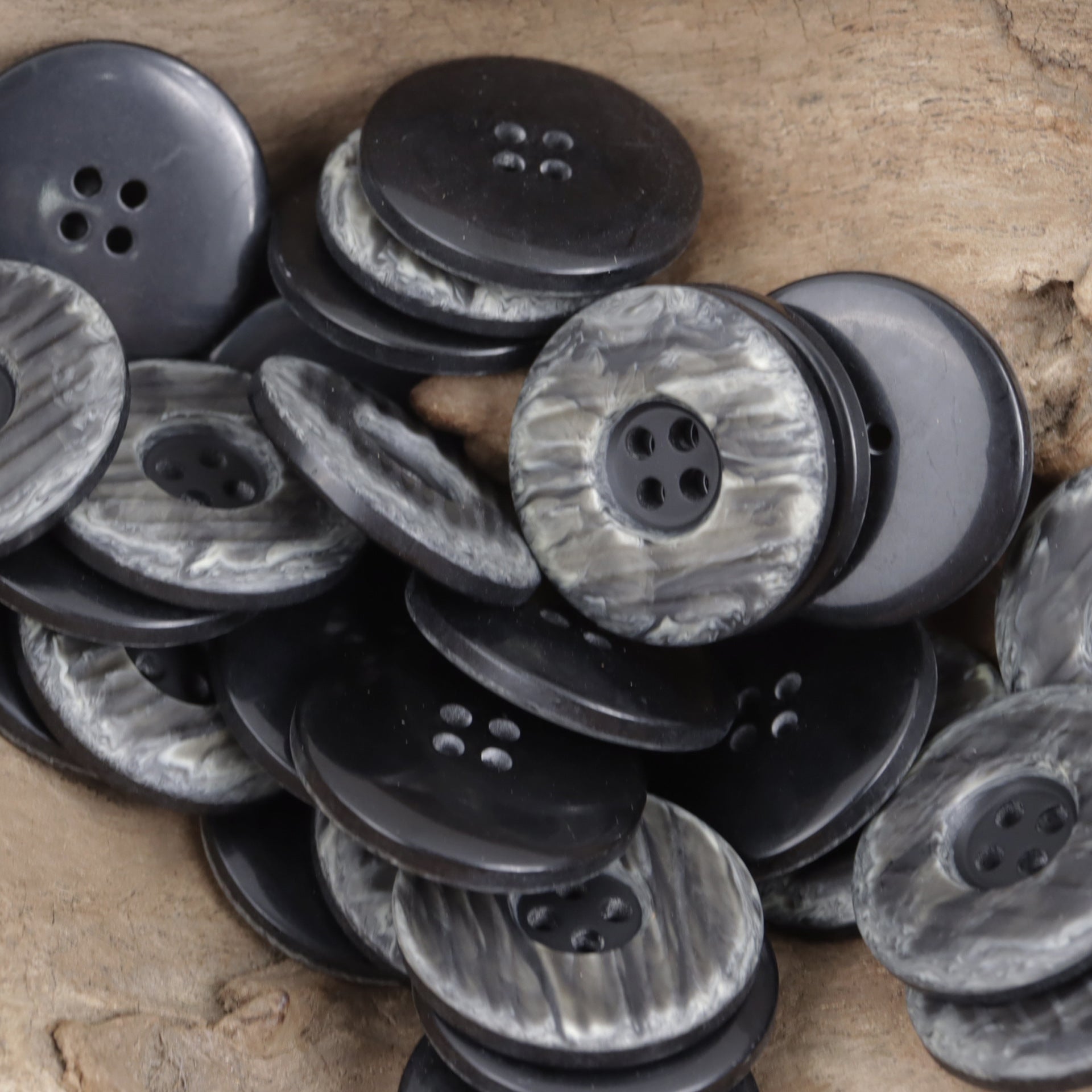 Black/charcoal two-tone resin buttons, round 4-hole, marbled assortment