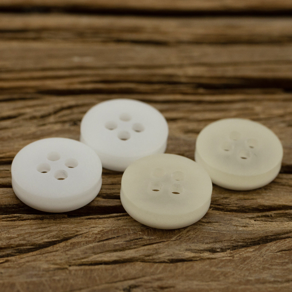 11.5mm translucent resin shirt buttons, 4-hole, white, front faces