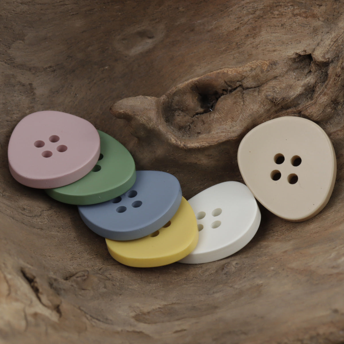 Irregular 4-hole resin buttons in pastel mix: lilac, green, blue, yellow, white