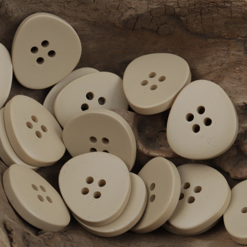Irregular 4-hole resin buttons, khaki/cream set with four holes