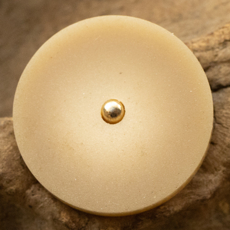 Single round frosted resin button with metal shank, light orange-beige