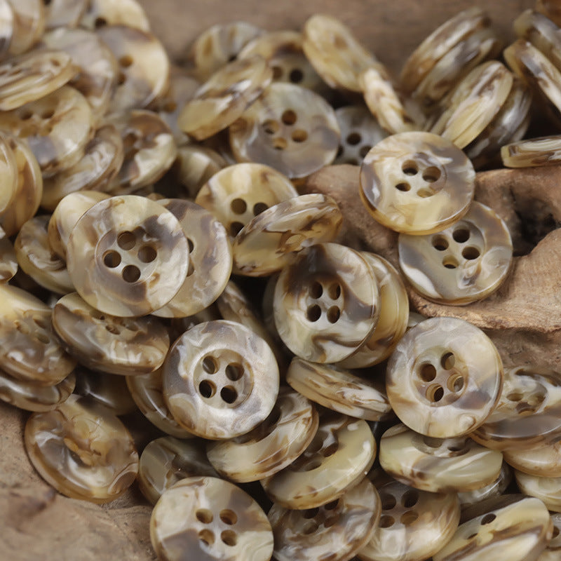 Light-brown resin buttons with four holes, swirled marbled finish, bulk lot