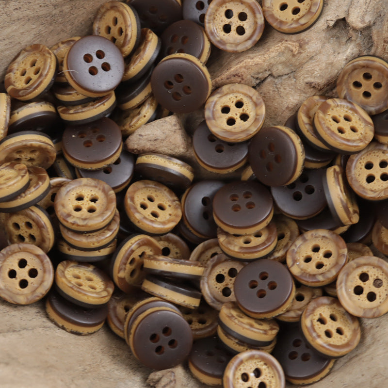 Four-hole resin buttons in dark brown and tan two-tone pebble pattern, mixed pile