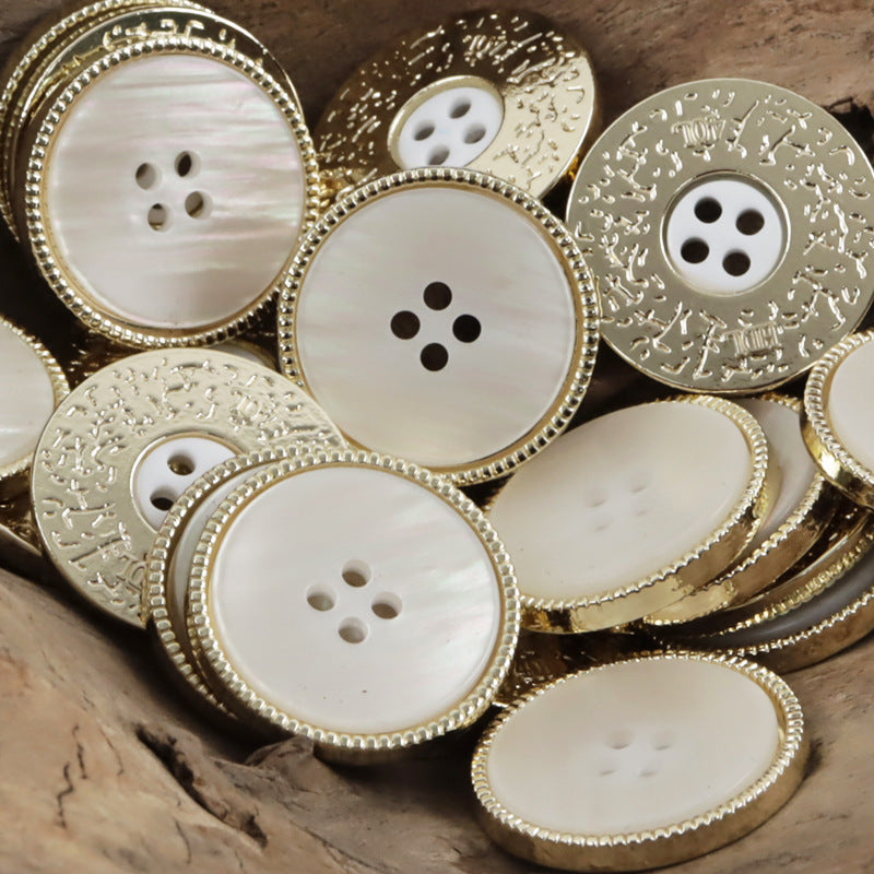 Double-sided two-tone buttons assortment, white/beige resin faces with gold textured rim