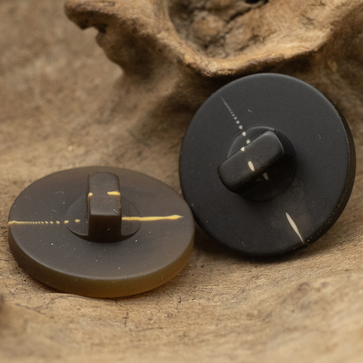 Coffee and black flat resin shank buttons, water-speckle finish