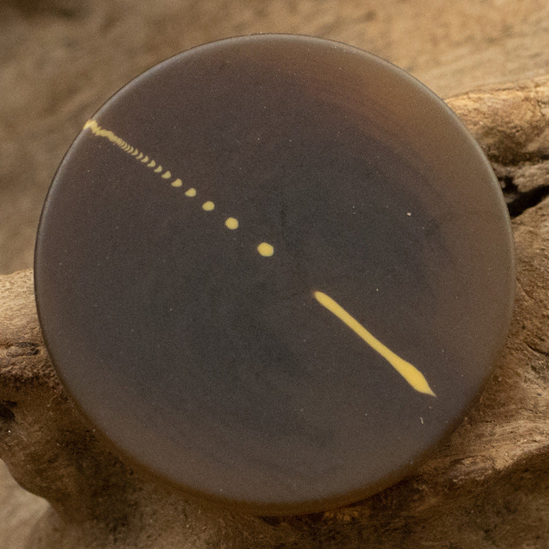 Matte brown resin button, flat front with dotted 4-hole pattern