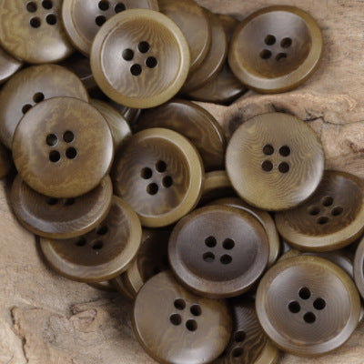 Gray-brown round tagua nut buttons with four-hole design, 10-pack