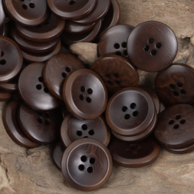 Dark brown round tagua nut buttons with four-hole design, 10-pack