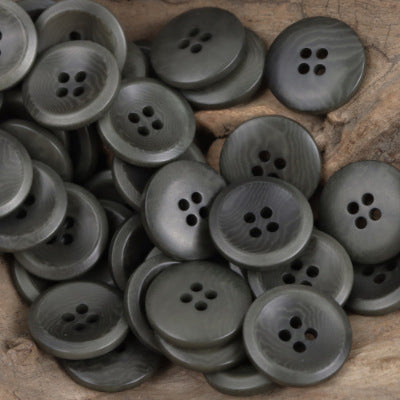 Gray round tagua nut buttons with four-hole design, 10-pack