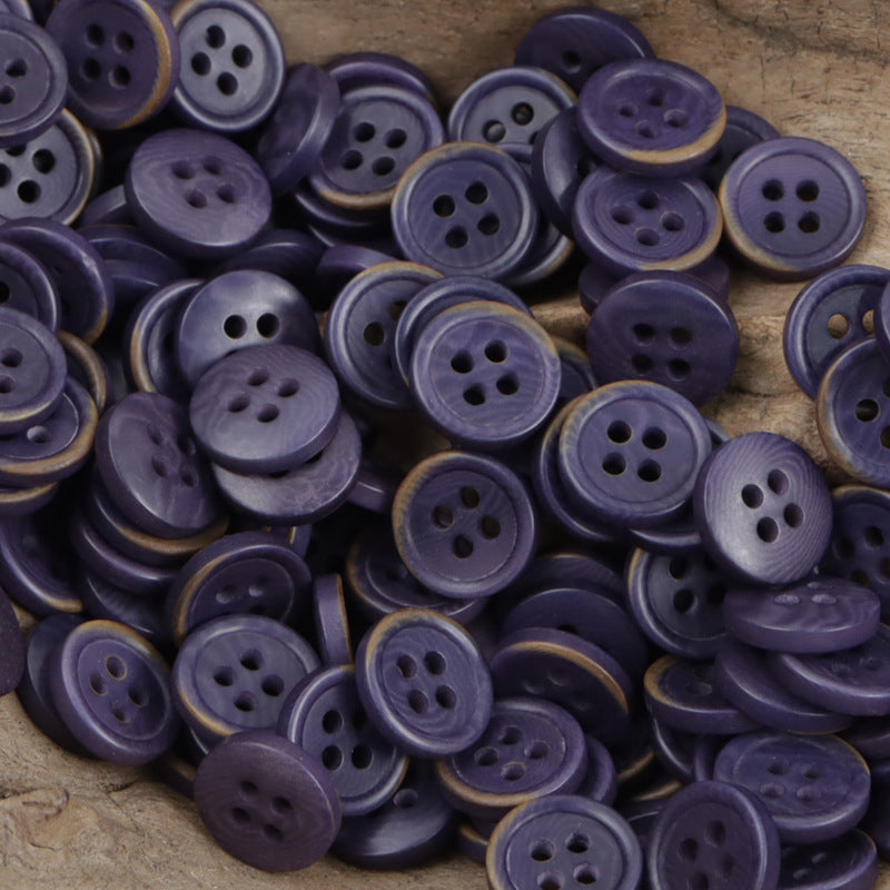 Natural fruit buttons pile in deep purple tones, round fronts with four holes
