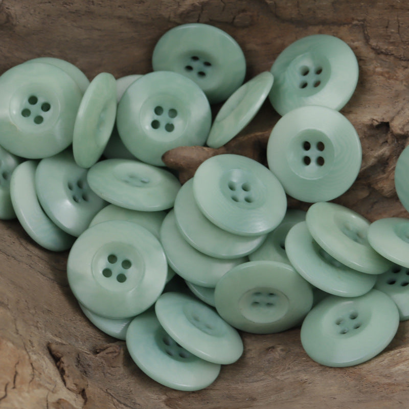 Mint green double-sided Chinese fruit buttons, 4-hole design on round fronts
