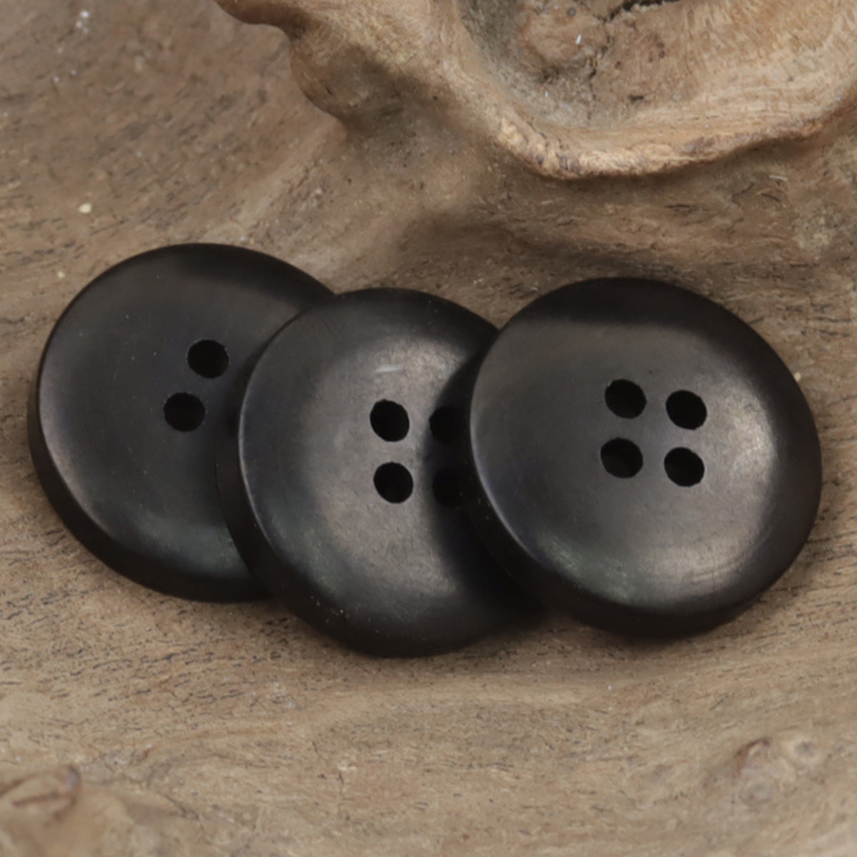 Matte black round tagua nut buttons, 4-hole set of three
