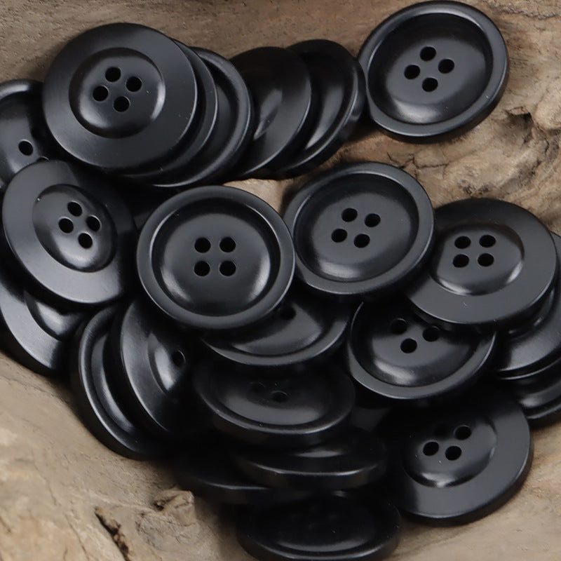 Four-hole nut buttons in black, assorted 10 pcs