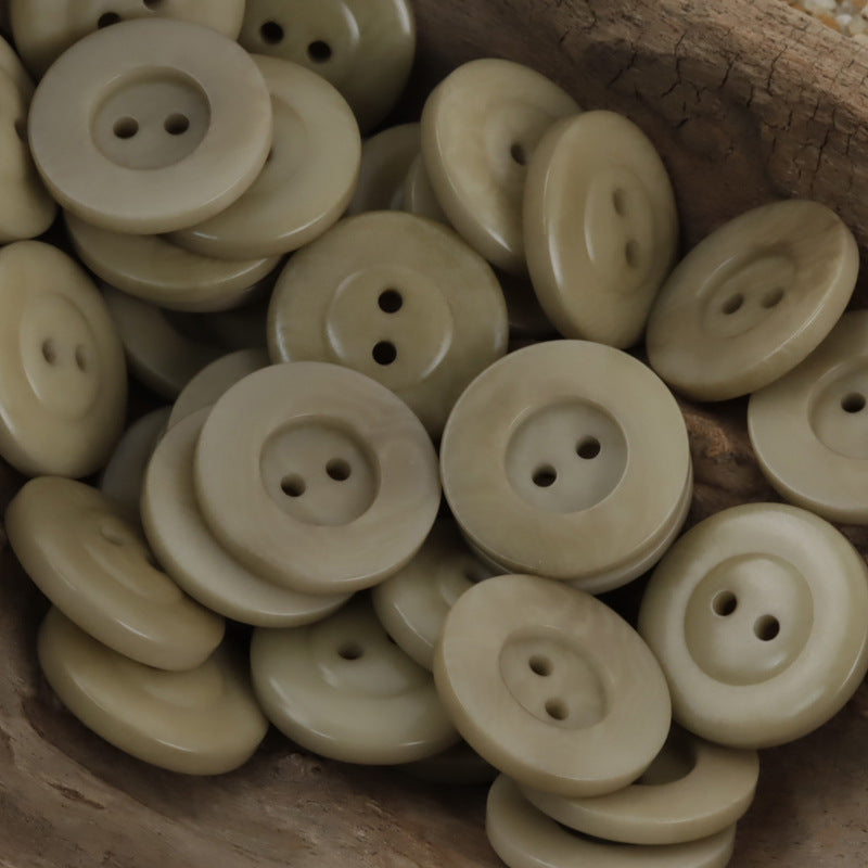 Classic two-hole nut buttons in khaki/beige, round with 2 holes; 10 pcs