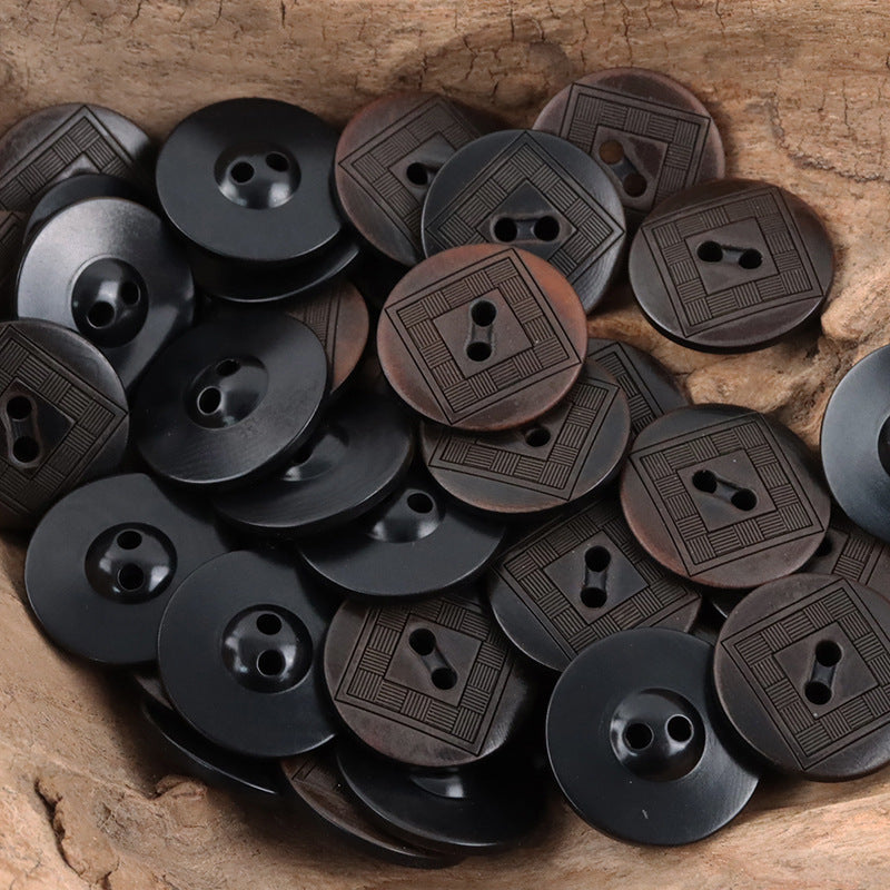 Dark brown/black tagua nut buttons with engraved chessboard pattern and two holes