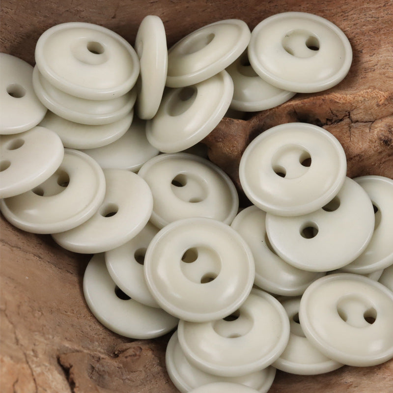 Cream/white two-hole tagua nut buttons, flat round style