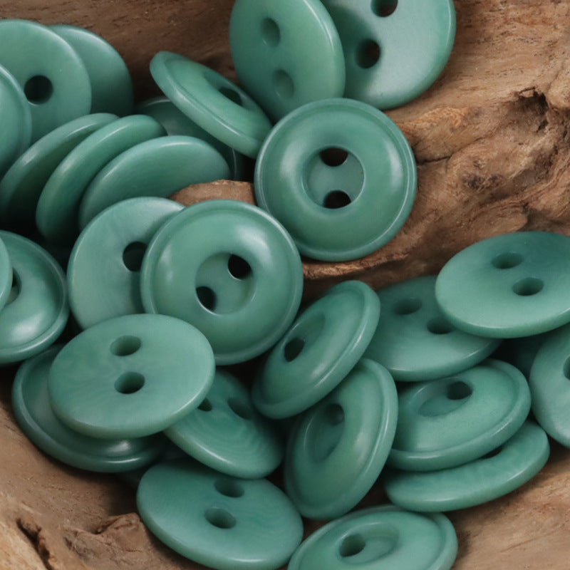 Green two-hole tagua nut buttons, round with two holes