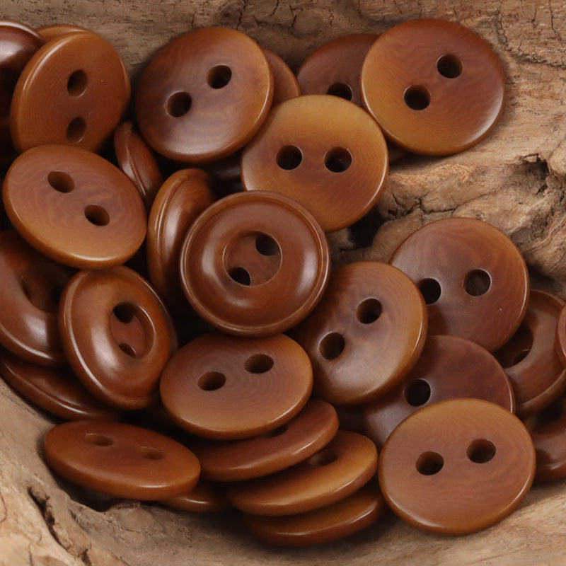 Coffee-brown two-hole tagua nut buttons, round with two holes