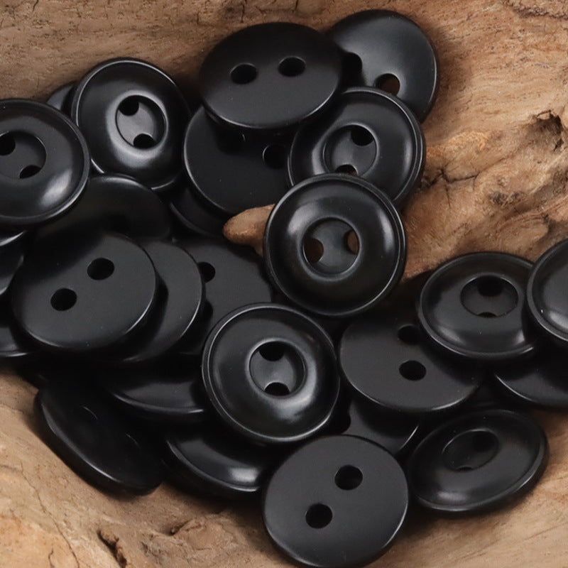 Black two-hole tagua nut buttons, round with two holes