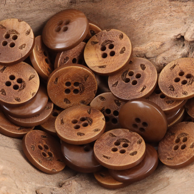Coffee brown round 4-hole nut buttons with etched leaf pattern
