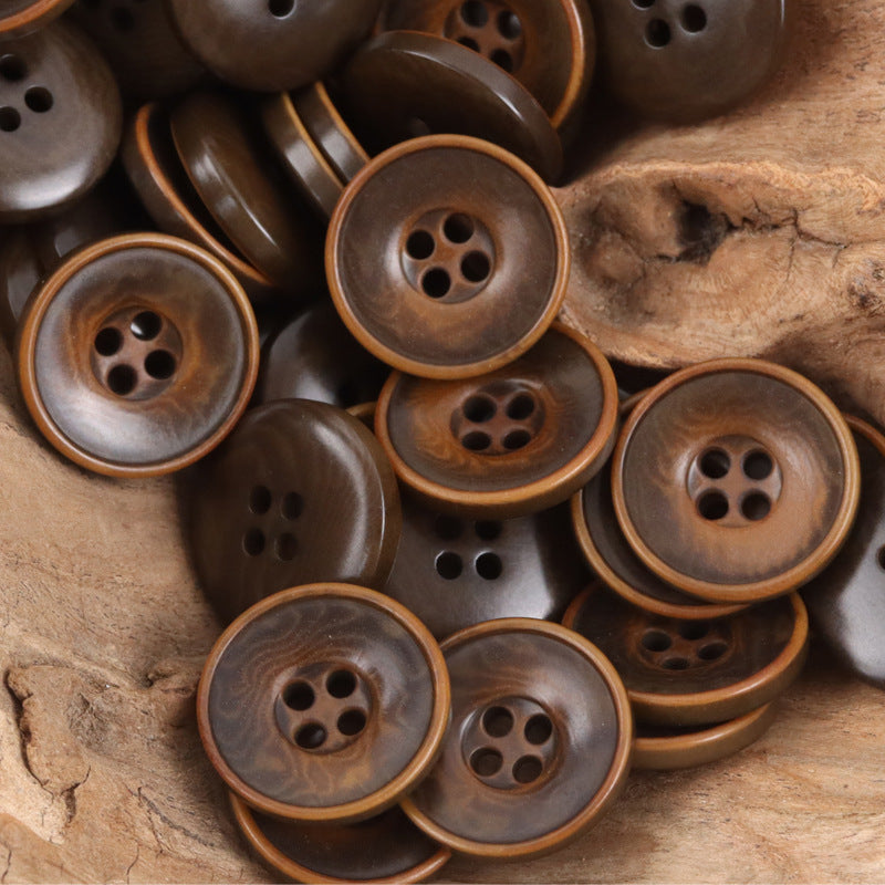 Mixed brown nut-style buttons with 4-hole faces and gold-toned rim