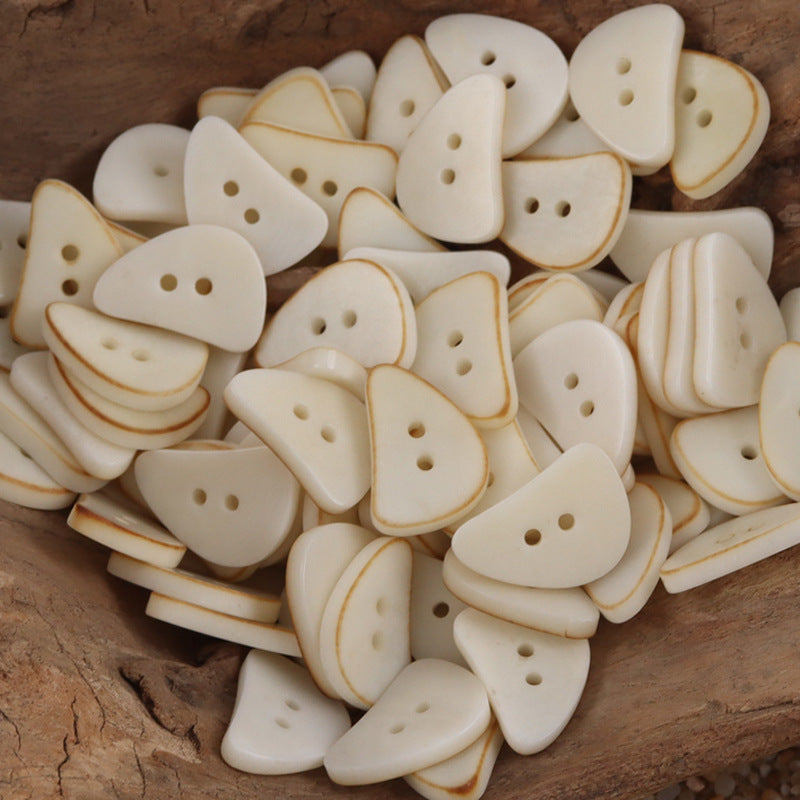 Natural white crescent moon corozo buttons with two holes, multiple pieces