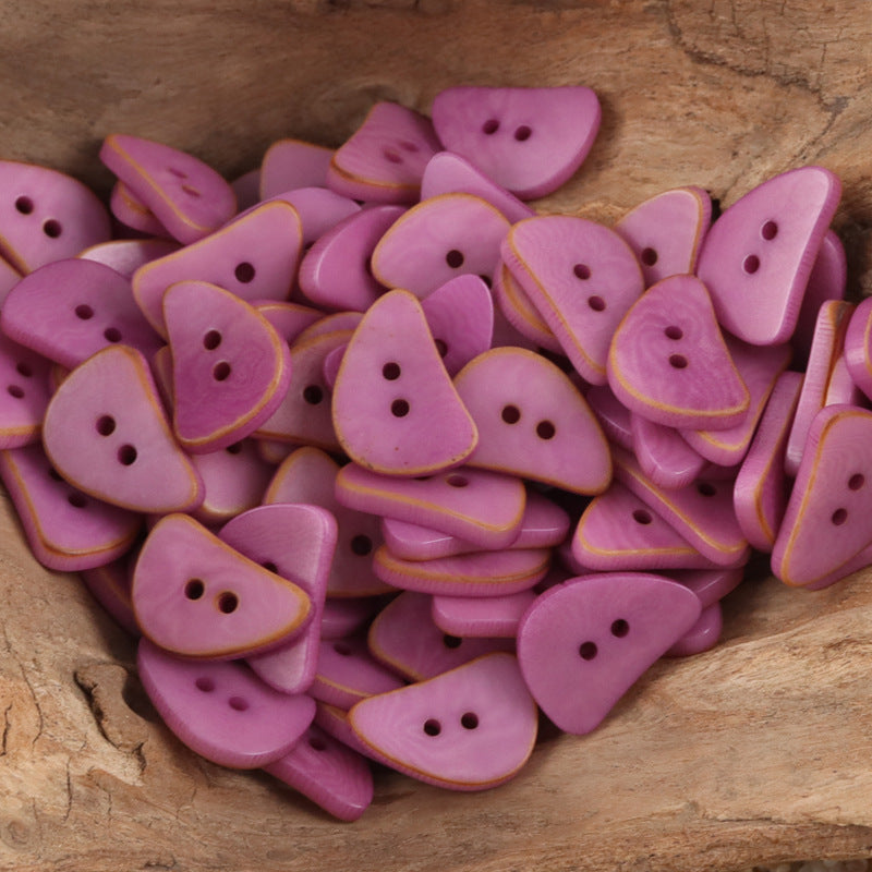 Purple crescent moon corozo buttons with two holes, assorted pieces