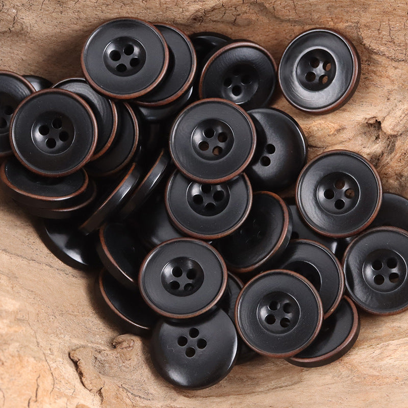 Dark navy and black nut-style buttons, round with 4-hole fronts