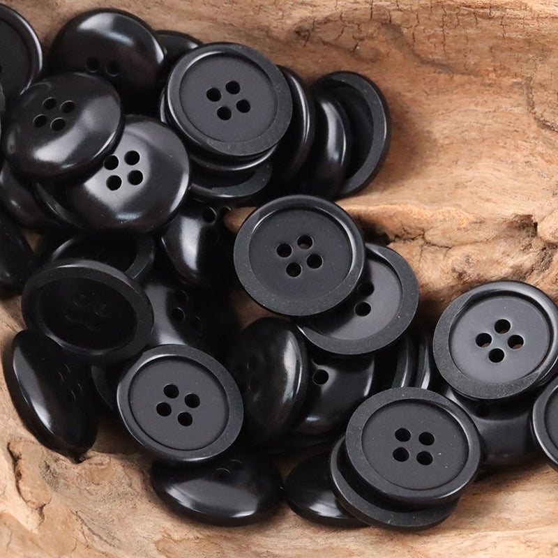 Black Tagut nut buttons with 4 holes, round flat buttons (grouped view)