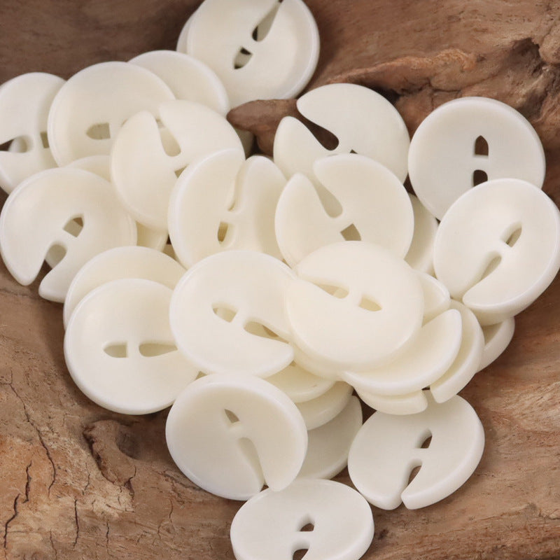 Pac-Man tagua nut buttons, white-cream round design with face cutouts