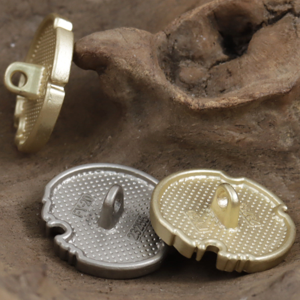 Broken notch lion shield metal buttons, gold and silver, backs with posts