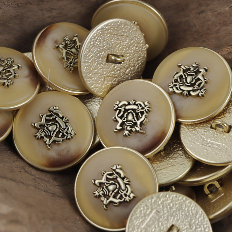 Khaki round metal buttons with lion crown crest and gold shank