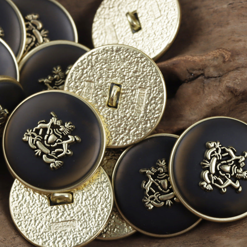 Black round metal buttons with gold lion-crown crest and loop shanks