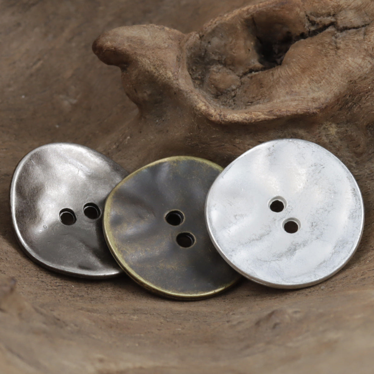 Curved matte metal buttons, round; silver with 2 holes, dark bronze with 3, white with 3, 10-pack