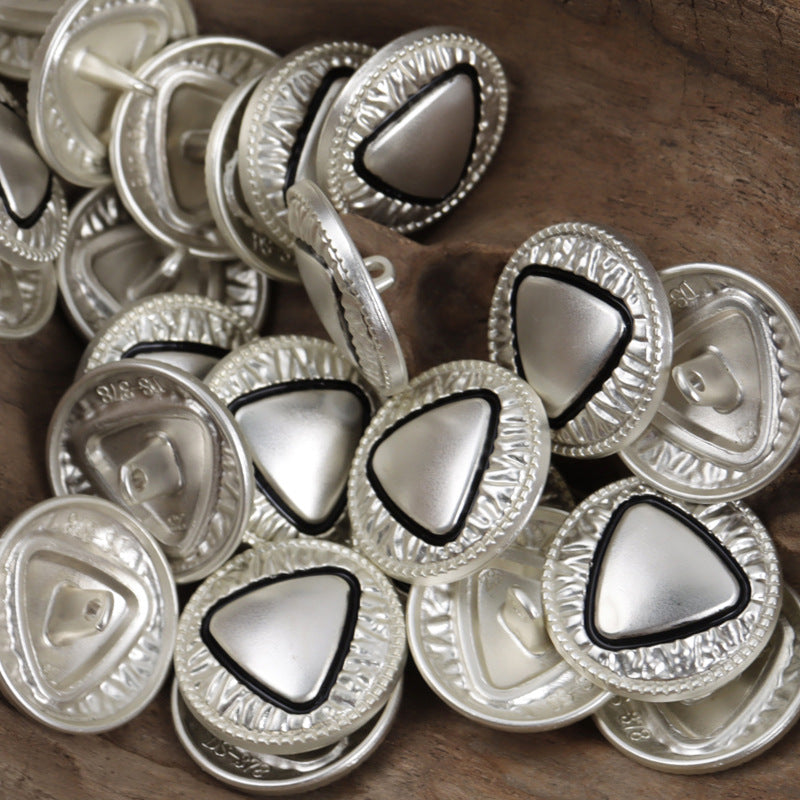 Silver metal shank buttons with triangle pattern centers and decorative border