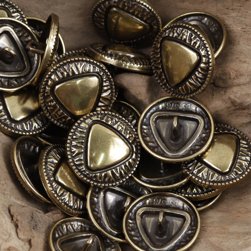 Bronze metal shank buttons with triangle pattern centers and decorative border