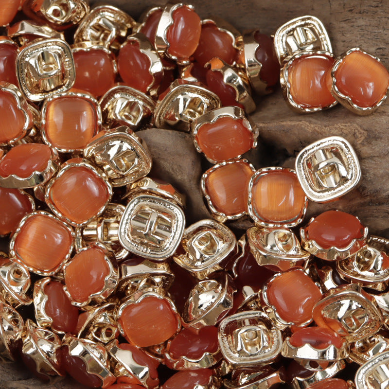 Orange and caramel square jade buttons with silver metal rims