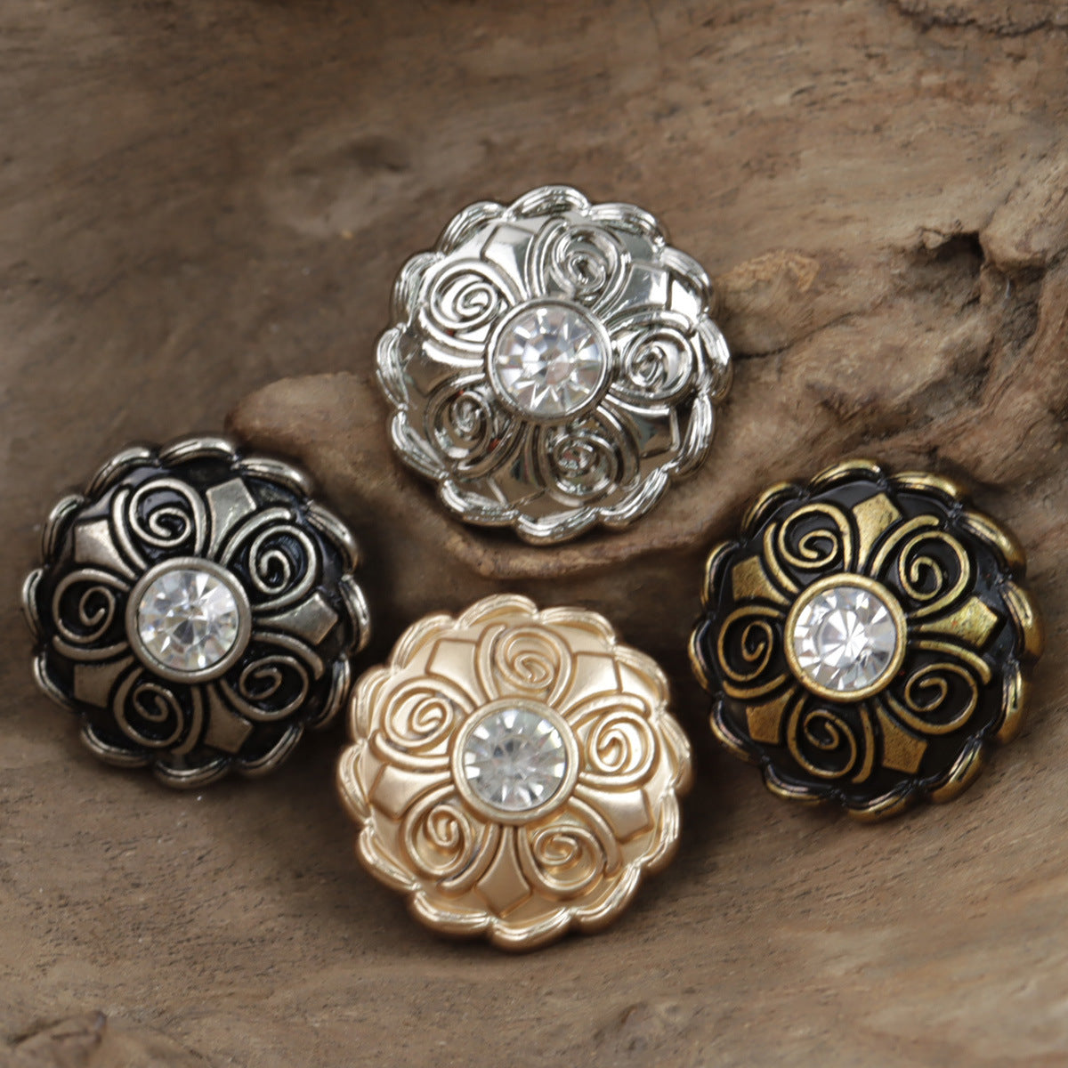 Antique coat buttons with clear crystal centers in gold and silver-tone filigree
