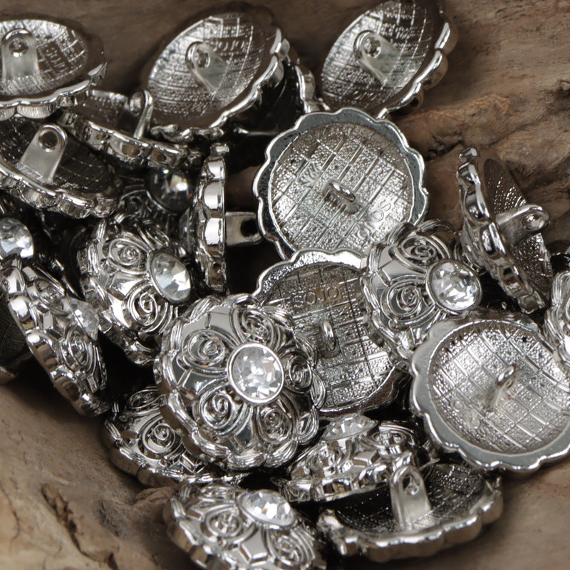Silver-tone antique coat buttons, back view with embossed grid and center pin