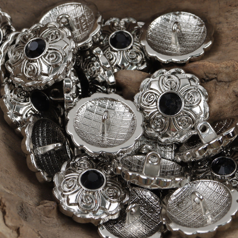 Antique coat buttons with black center stones and silver-tone filigree, assorted set