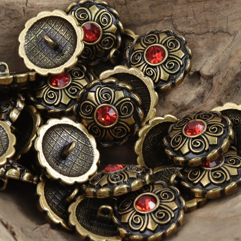 Antique coat buttons: gold filigree with red round crystal centers