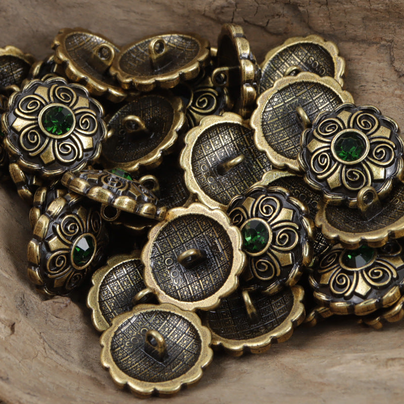 Antique coat buttons: gold filigree with green round crystal centers