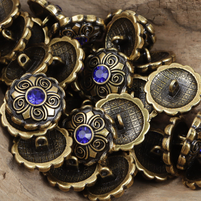Antique coat buttons: gold filigree with blue violet round crystal centers
