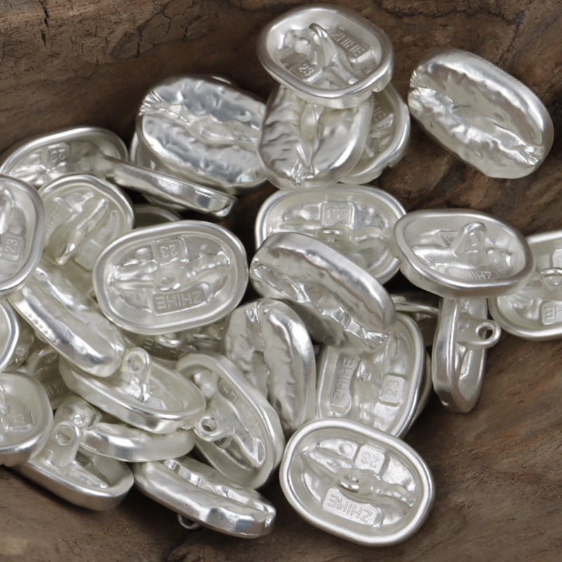 Silver-toned distressed coffee bean metal buttons, oval fronts with loop shanks (10 pcs)