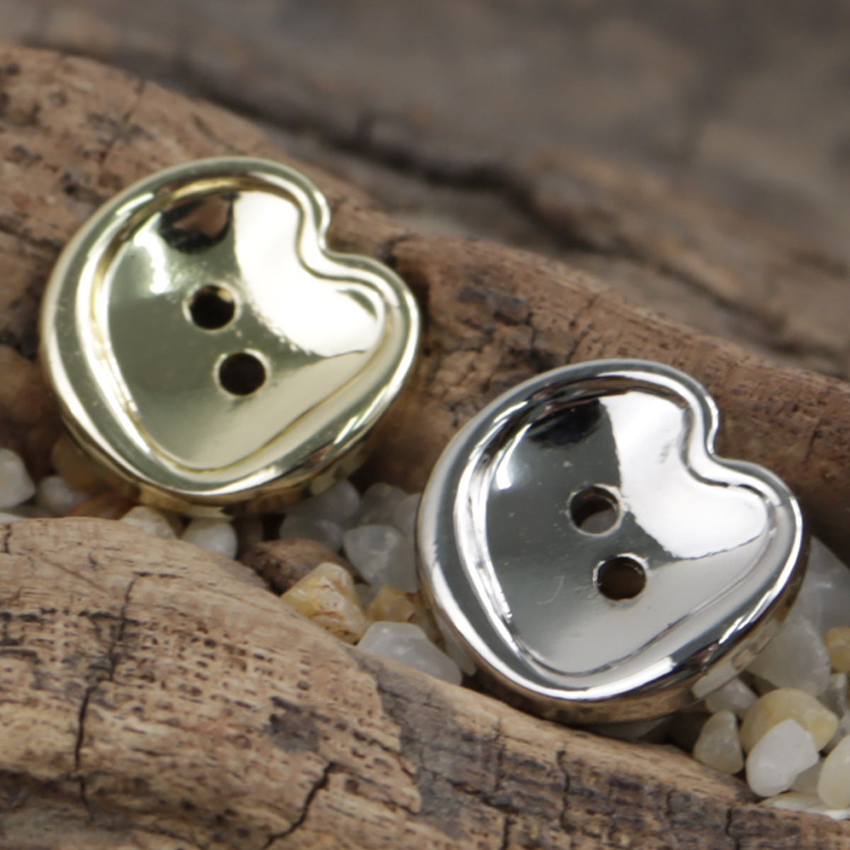 Two-hole peach-shaped metal buttons, gold and silver, mixed set
