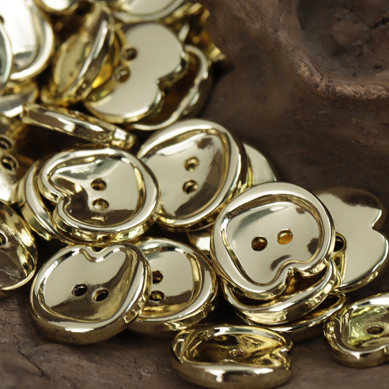 Peach-shaped metal buttons, two-hole gold, bulk assortment