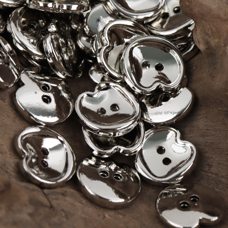 Peach-shaped metal buttons, two-hole silver, bulk assortment