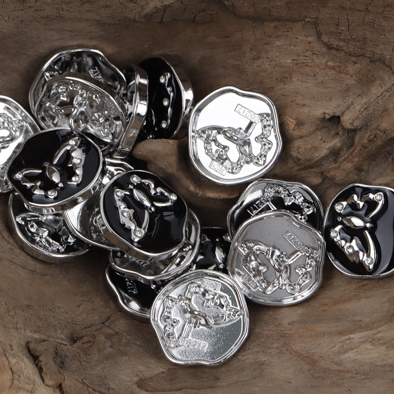 Black silver butterfly metal shank buttons, irregular round faces with rhinestone accents