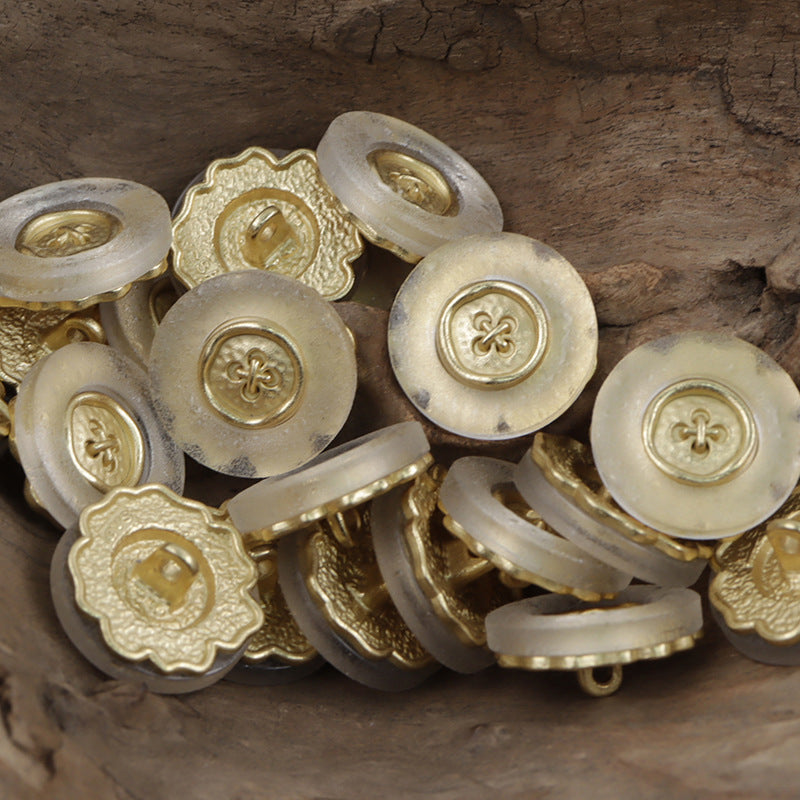 Gold and silver small flower metal buttons, circular backs with metal loops