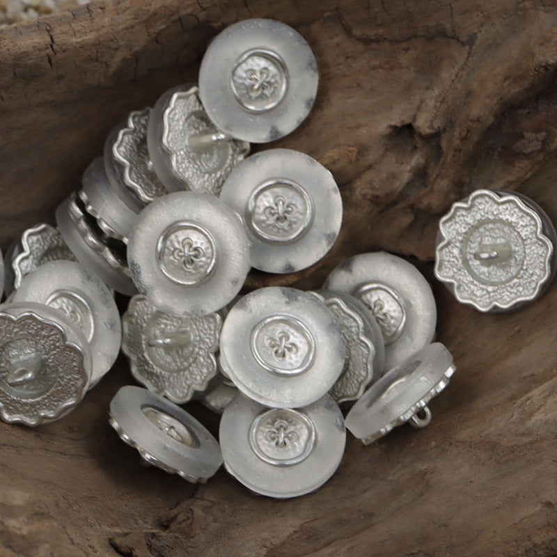 Silver small flower metal button, circular matte face with embossed flower